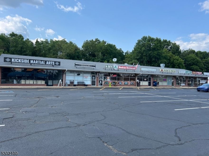 Be first to own this unique strip mall in a highly desirable area with many surrounding corporations and hotels on busy highway location buyer can add two levels of apartments to existing structure can add 16 apartments to make this great investment much better!