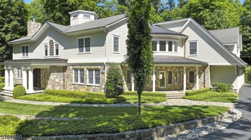 Nestled on over 2 tranquil acres of expansive & landscaped greenery, this gorgeously gated East Hill Saddle River Estate home combines all of the most coveted modern amenities over 6,700 sq ft of exquisite living space. The interior of the home provides 6 spacious BRs, 10 Baths & a resort-style yard w a heated in-ground pool & a one-of-a-kind full service cabana.  The first floor offers a lavish open-concept design, a two-story foyer, gourmet chefs eat-in kitchen, large center island & top-of-the line appliances. The first level is complete w a grand two-story living area w custom built-ins, fireplace, direct access to the backyard oasis, a butlers pantry, mud room, an office suite & first level solarium that offers extensive views to the front courtyard, offering exceptional privacy & convenience as the home's informal entrance.The upstairs level features a majestic & contemporary designed primary suite w two large custom closets, a spa-like en-suite bath & gas fireplace. The second FL balcony leads to the opposing wing of the home that features 4 more spacious BRs, each w access to a full private bath. The interior of this home is complete w the full height 3,000 sq foot finished basement that provides a family room, theater, fitness center, mirrored dance studio, wet bar/kitchenette, an additional bedroom & two full baths. The residence offers additional amenities including Control4 system, Security System, Generator & a 3 car garage.