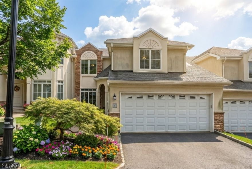 This exquisite home combines stunning western sunset views with unmatched comfort, style, and convenience. Featuring 3 bedrooms and 4.1 bathrooms, the thoughtfully designed layout is perfect for both entertaining and everyday living.The chef's kitchen open to family room with gas fireplace seamlessly connects to the spacious combination dining and living area. An expansive decks on the main level is accessed from the kitchen and the dining room, perfect for outdoor grilling while another covered pation on the garden level offer serene spaces to unwind. The primary suite is a true sanctuary, boasting two luxurious bathrooms and dual walk-in closets, a rare touch of indulgence. The finished garden level provides additional living and entertainment space, including a full bath, while ample closets throughout the home ensure effortless storage. A second-floor laundry room adds even more convenience.Beyond the home, enjoy a resort-style lifestyle in a vibrant community with 24-hour gated security, concierge services, indoor and outdoor opulent heated pools, spa rooms, fitness and yoga/aerobic spaces, card rooms, tennis courts, and scenic landscaped walking paths. Hosting a celebration? The beautifully designed event spaces are perfect for any occasion, open to beautiful expansive terrace in main building offering stunning western views.Note: Buyer is responsible for two months' maintenance for the reserve fund and two months of prepaid maintenance at closing.