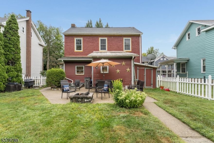 Timeless 2/3-Bed, 2-Bath RESIDENTIAL/COMMERCIAL ZONED PROPERTY in the Heart of Belvidere. Welcome to this beautifully maintained Colonial nestled in the vibrant town of Belvidere. Blending lasting elegance with modern convenience, this home showcases stunning original trim work and ornate detailing that exude character and charm throughout. Step inside to find a warm and inviting layout, featuring a formal dining room that seamlessly flows into the spacious living area ideal for hosting and entertaining. The home is move-in ready, offering classic architectural beauty complemented by thoughtful updates for today's lifestyle. Enjoy outdoor living year-round with a meticulously landscaped yard and a private patio perfect for morning coffee or evening gatherings. The property also boasts four off-street parking spaces for added convenience. An exceptional bonus: this home is zoned for commercial use, presenting endless opportunities for an in-home office, small business, or studio space all while enjoying the comfort of residential living. Don't miss this rare opportunity to own a versatile, character-filled home in one of Belvidere's most sought-after locations. Schedule your showing today and discover all the possibilities this unique property has to offer!