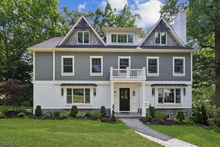 You will fall in love with this stunning 6 bedroom, 5.1 bath Custom Colonial, totally gut renovated with elegant design and superior craftsmanship and ideally located on a blissfully quiet street just a 0.4 mile walk to highly rated Deerfield Elementary School! The bright living room boasts a gas fireplace, while the sunlit dining room is perfect for entertaining. The gourmet eat-in kitchen features custom cabinetry, a large center island, quartz countertops and top-of-the-line Viking appliances, as well as a butler's pantry, and is totally open to the family room, for the ideal floor plan, with custom cabinetry & an electric fireplace. The 2nd level features a luxurious Primary suite, boasting a spacious custom walk-in closet & a spa-like Primary bath featuring a deep soaking tub, double sinks & a sleek glass shower. Another en suite bedroom with balcony and 2 more bedrooms sharing a beautiful full bath complete the 2nd level. The 3rd level features a bedroom & full bath and bright office with great privacy, accentuated by charming exposed wood beams. The lower level is beautifully finished with a recreation room, wine cellar, 6th bedroom & beautiful full bath. A spacious back patio, complete with an outdoor kitchen, is perfect for everyday use as well as entertaining. The landscaped grounds are reminiscent of a botanical paradise, complete with a charming bridge. Builder agrees to install a fence around the perimeter of the backyard.