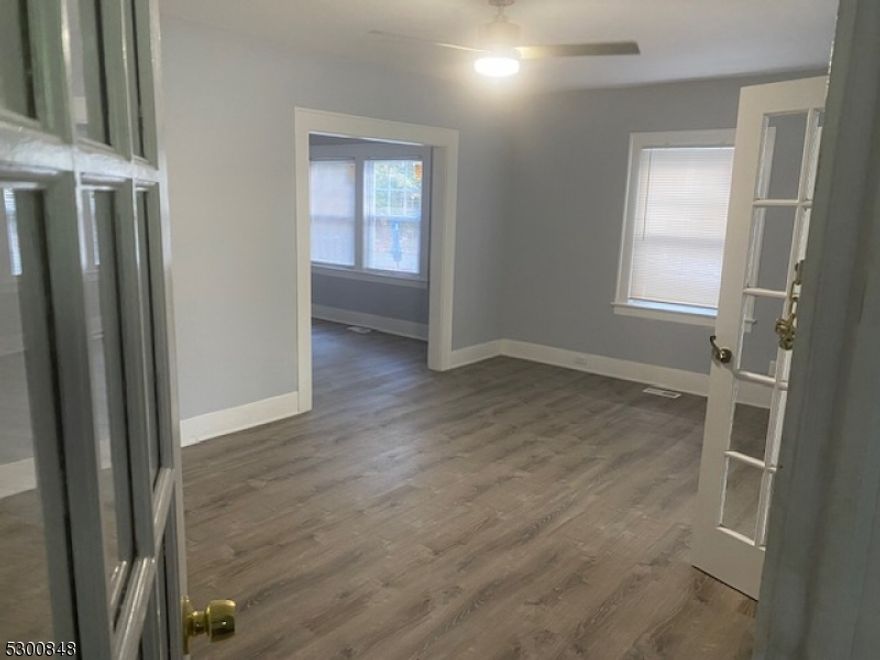 Beautifully renovated 2 bedroom + Bonus Sunroom, 1 full bath 1st Flr apartment located just off of Bloomfield Ave in vibrant Montclair! Perfectly located within short walking distance to downtown, where you'll find endless options for award-winning restaurants, boutiques, and open-air markets. Multiple parks and nature trails are only minutes away for outdoor activities, with Glenfield Park and Glen Ridge tennis courts directly across the street. The true commuter's dream, The Apartment is located less than a ten minute walk from both Glen Ridge and Bay Street stations with direct service to Manhattan.With 1,000 sqft of living space across this first floor, this sophisticated unit is highlighted with large bedrooms, in-unit washer/dryer, all-new stainless steel GE appliances, granite countertops, and energy-efficient central heating/cooling. Natural light and modern finishes are abundant throughout the unit.1 on-site, off-street parking spot included in rent. All utilities are included in the rent along with Electricity!! Tenant has access to private yard space. Pets will be considered on a case by case basis. This is a non-smoking unit. Shared driveway for off street parking and use of backyard. This unit is situated right across the street from Glenfield park and close to New York City, major highways and mass transportation.