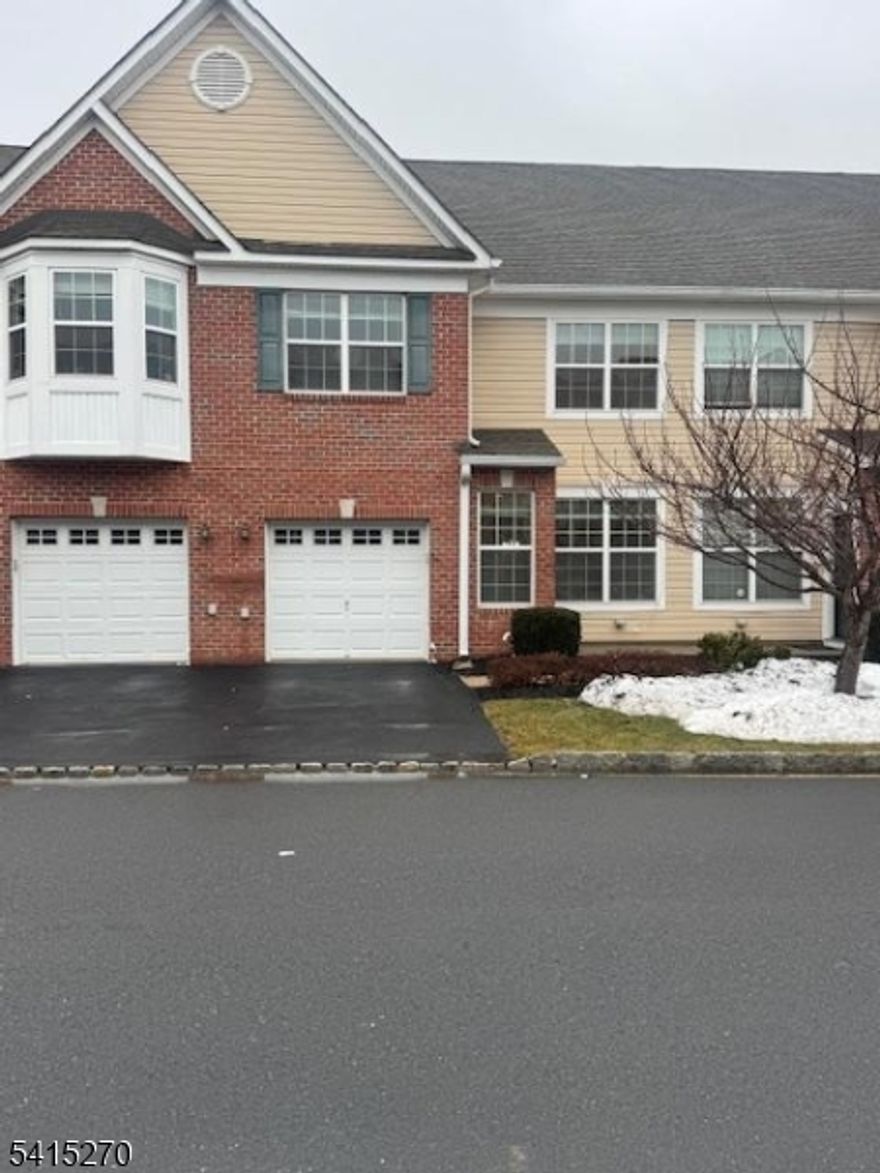 Welcome to this well-maintained, freshly painted, 3-bedroom, 2.5-bath townhouse conveniently located in the desirable Hartland Square, ready for itsnew owner. This inviting home offers a comfortable layout with bright and functional living spaces.The living room features recessed lighting, while theformal dining room provides a great space for gatherings and entertaining. The kitchen is equipped with stainless steel appliances and granitecountertops, offering both style and practicality.The impressive two-story family room with hardwood flors, adds an open and airy feel to the home,creating a perfect place to relax. Upstairs, you will find three spacious bedrooms and two full bathrooms.The primary suite features a vaulted ceiling,recessed lighting, two WIC, and a private bath with double sinks and a shower stall. Upper-level laundry room adds everyday convenience.A slidingdoor from the kitchen opens to a fenced backyard, ideal for relaxing, gardening, or outdoor enjoyment. Additional features include a 1-car garage wiredfor an electric vehicle charger, private driveway, and ample open parking for guests.Conveniently located near shopping, dining, parks, schools, andentertainment, with easy access to major highways including U.S. Route 1 and New Jersey Route 27, making commuting simple.A great opportunity toown a comfortable home in a convenient location.