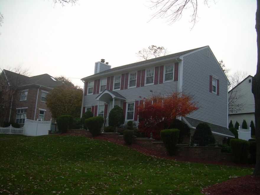 Welcome to this spacious Colonial located in Newark's desirable Forest Hill section, where the charming porch sets the stage for timeless architectural appeal. This home features an inviting entry foyer, a generous living room with a fireplace, a formal dining room, a kitchen with a butler's pantry, and a cozy family room. With six bedrooms, two full bathrooms, a private two-car garage, and an ample driveway, there's plenty of room for comfort and convenience. The spacious backyard is perfect for outdoor entertaining and relaxation.  Nestled on serene, tree-lined streets surrounded by historic architecture, the neighborhood offers quick access to major highways, Branch Brook Park, and transportation making this an ideal place to call home. Property to be sold "as is" condition.