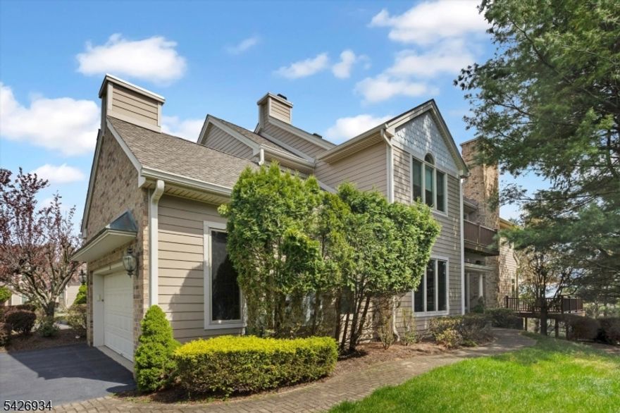 A rare opportunity to own one of Longview's most sought-after and limited Devonshire II models, perfectly positioned for exceptional privacy and breathtaking views. This 3-bedroom, 3.5-bath home is designed for both comfortable living and elegant entertaining.Step inside to a stunning two-story foyer that sets an impressive tone. The main level features a large dining room, a generous living room, and a versatile den. The kitchen is appointed with stainless steel appliances and a convenient butler's pantry. Sliding doors from the living room and den open to an expansive wraparound deck, creating seamless indoor-outdoor living.Outdoor spaces are a standout, with a private deck off the primary bedroom and a separate patio off the kitchen perfect for grilling and casual dining.Two gas fireplaces add warmth and ambiance, while a whole-house fan helps keep cooling costs low.The lower level provides additional living space with a full bath, office, recreation room, and ample storage, offering potential for a 4th bedroom.Enjoy the outdoor pool, tennis and pickeball courts