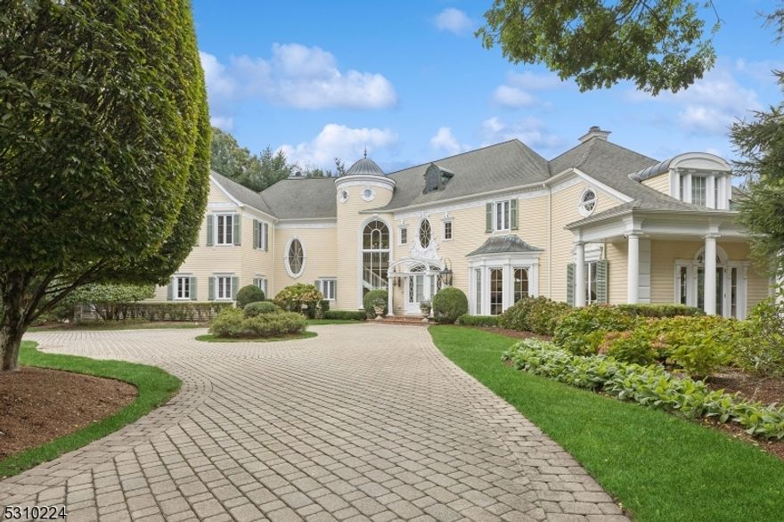 Luxury at its Finest!A Custom-built Colonial style estate situated at the end of a gorgeous tree lined Cul de Sac.This spectacular, one-of-a-kind extraordinary home is a masterpiece of luxury and craftsmanship, brimming with exquisite details that showcase unparalleled elegance. The intricate moldings and finishings throughout the home are a testament to the meticulous attention to detail that went into its design. A grand curved staircase greets you in the foyer, setting the tone for the opulence found in every corner.The elegantly appointed library drenched in natural light from 9ft French doors, offers a serene space for reading or contemplation.The GRT RM is a breathtaking centerpiece, featuring 3 sets of floor-to-ceiling doors opening to the rear brick patio & outdoor oasis.Enchanting primary suite + 4 bedrooms & 2 additional.FBTHS Finished LL w/custom wine cellar,billiard Rm,gym,FBTH + media rm. Lush landscaping, pool,elegant pool house w/FBTH,2 Koi ponds surrounded by English style perennial gardens.