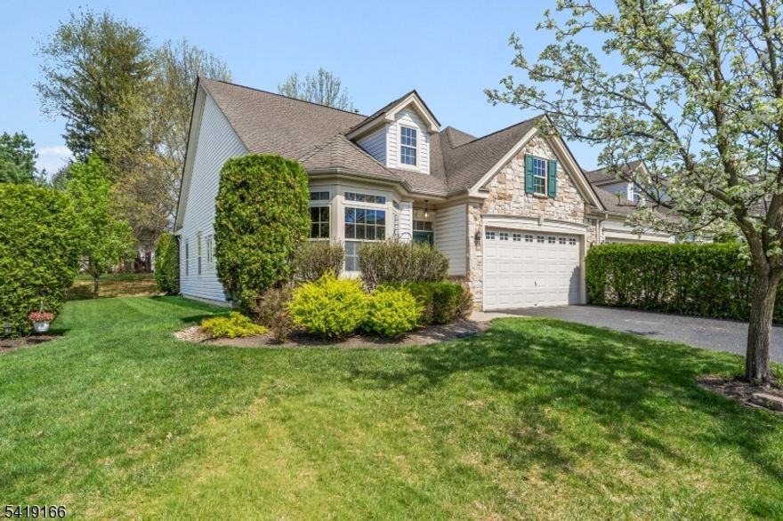 Welcome home ! FANTASTIC RANCH STYLE TOWNHOME LOCATED IN THE DESIREABLE DELAWARE CROSSINGS 55+ ADULT COMMUNITY. This wonderful home flooded with natural light consists of two bedrooms and two full baths.  The dining area overlooks the large living room.  The living room has a gas fireplace and sliders to access your private patio for you to sit and enjoy. Natural light bursts through the large windows throughout the home.  The Primary bedroom features tray ceiling, plenty of closet space and primary bath with a shower and a separate soaking tub. The second bedroom can be utilized as an office or den. The home  features a washer and dryer for your convenience. There is also a two car garage. Delaware Crossing Community offers an active lifestyle with amenities such as a clubhouse, heated pool, fitness center, sports courts, and bocce ball.   Located only minutes to Rte. 57 and 22.  There are medical facilities, shopping, and dining within minutes.