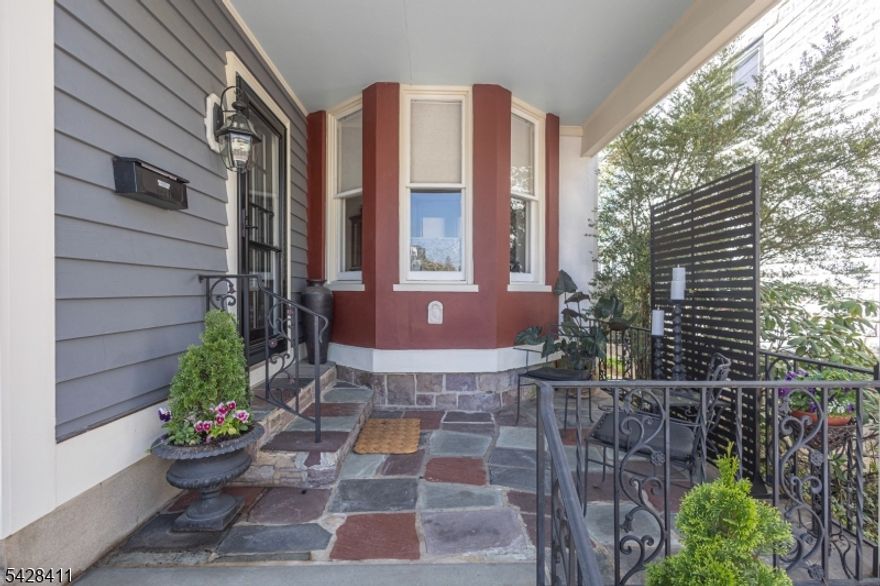 A beautifully restored Victorian in the heart of historic Lambertville, is steps from the towpath, and offers flexible living and commercial possibilities. The home blends original character - exposed brick, high ceilings, and custom built-ins - with modern updates like central air, newer appliances, natural gas, and updated heating/cooling. The property includes four bright bedrooms, five full baths, and two renovated kitchens. The main residence features a large eat-in kitchen that opens to a bright living room. The expansive back yard boasts a private deck, storage shed, and lovely perennial gardens. The front portion of the home currently serves as an owner's studio, and is grandfathered for salon-type owner-occupied commercial use. A legal one-bedroom apartment with a large eat-in kitchen, living room, bedroom with extra storage, sitting room with closet, and full bath is ideal for guests or rental income. The finished basement adds a full bath, laundry, walk-in cedar closet and extra storage. Custom bookshelves, trim, and closets provide craft detail throughout. New windows, siding, fresh paint and a front sitting porch enhance curb appeal. Located in the heart of town, the property offers generous living space and easy walkability. Spend your weekends exploring Lambertville, NJ and New Hope, PA, known for their restaurants, galleries, and independent shops. This property provides a rare mix of historic charm and modern systems with an excellent in-town location.