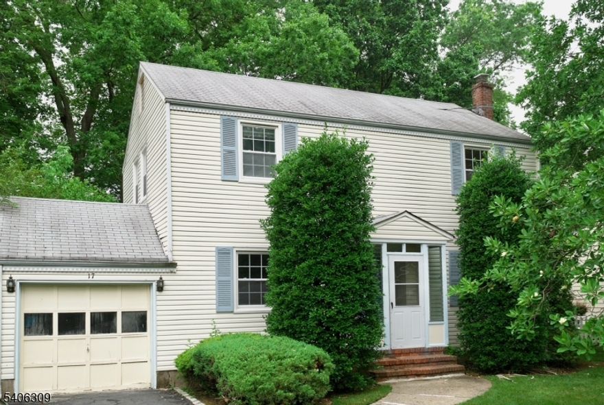 Charming Center Hall Colonial in Quiet Neighborhood. Large Great Room W/ Skylight and Palladium Windows. Large Deck in backyrad, Convenient Location, Walk to Schools, Library, Entertaining, Shopping and NYC Commute.
