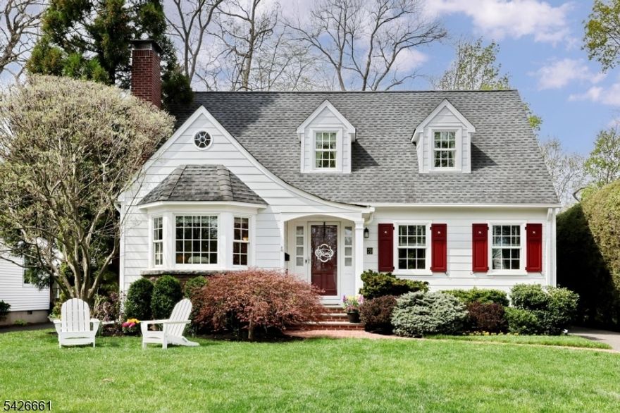 Sitting pretty on one of the most coveted streets in Glen Rock as if it were plucked from the pages of a fairytale, is this thoughtfully expanded 5 bedroom, 3 full bath home. Meticulously updated, you will be charmed from minute one. Starting with the perfectly landscaped front yard, paver walkway, and foyer leading to a large living room with gorgeous architectural details, gas fireplace and hardwood floors. Continue to the dining area leading to the open concept, renovated kitchen with custom cabinetry, quartz counters, and SS appliances-ideal for entertaining.  Leading off the dining area is a bright den flanked with windows, with easy access to the private backyard as well as one car garage and driveway. The first level continues with a full hall bath, sizable Bedroom # 1, Bedroom # 2 used as an office, and ample closets throughout.The 2nd level features the Primary Bedroom Suite with large walk in closet, expansive Primary Bath and other storage nooks. The 2nd floor continues with a full hall bath, Bedroom # 4 and charming Bedroom # 5 complete with an attached room that can be used as a playroom, or additional oversized closet.The lower level offers an expansive partially finished basement with rec room, laundry, storage-the possibilities for the unfinished portion are endless.The backyard is your own private oasis with plenty of room to relax or gather. Close to Glen Rock's highly rated schools, NYC transportation and more, 70 Ridge Road is where your story begins!