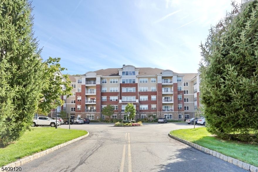 Wonderful 1768 SF 4th floor Colfax unit in Wanaque Reserve, a Del Webb active adult 55+ community.  This move-in ready home features hardwood floors...primary & 2nd bedroom floors just replaced, a primary bedroom ensuite with full bath tray ceiling and WIC, 2nd bedroom, FB, EIK with granite counters, LR, DR and den/home office with French doors, adding a touch of elegance. The LR sliding doors open to a private balcony. Amenities include a deeded underground parking spot and 24-hour security. The 20,000 SF clubhouse has a cafe, ballroom, exercise room, theater, sauna, indoor and outdoor pools and more than 45 clubs & activities which include the travel club (cruises, day & multi-day trips, casino trips) tennis, pickleball, canasta, poker, golf, etc. Parking spot #44.  Wanaque Reserve offers a luxurious lifestyle for its residents with a focus on modern amenities, security and a sense of community. The recent renovation adds a fresh and updated living environment. Seller will leave the dining room and kitchen table & chairs, rugs in living room & dining room, if wanted.