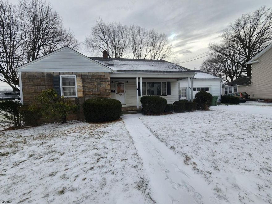 A ranch home with 2 bedrooms, den/office, eat in kitchen, nice size living room . In the kitchen and in the basement is a  hookup for a washer and dryer . In the over sized garage there is the access to the attic. This house is close to schools, down town, supermarket and major roads. There is a fire place in the basement but no information if it works.