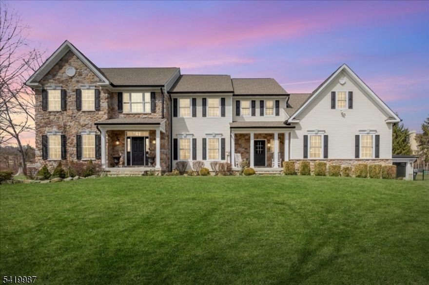This exquisite custom-built home at 38 Still Hollow Road in the desirable Tewksbury Township, NJ, offers luxurious living with thoughtful upgrades and premium finishes throughout. Nestled in a serene setting, this residence combines sophisticated elegance with exceptional functionality, perfect for entertaining and everyday comfort.Step inside to discover a stunning custom kitchen designed for the discerning chef, featuring high-end appliances, ample cabinetry, and thoughtful details. The adjacent living room impresses with a dramatic coffered ceiling and elegant built-ins, creating a warm and inviting focal point.Custom moulding graces the interiors, adding timeless architectural charm. Built-in speakers are wired throughout the home and extend to the exterior, allowing seamless audio enjoyment indoors and out.The first floor includes a versatile 5th bedroom/office with custom built-ins and a tailored custom office closet, ideal for remote work or guests. A practical mudroom features custom lockers and benches for effortless organization.Upstairs, the master bedroom suite is a true retreat, complete with a custom dressing area, built-ins, and a cozy electric fireplace. All bathrooms have been updated, with radiant heated floors in the primary bath and the Jack-and-Jill bathroom for added luxury.Just refinished hardwood floors (November 2025) gleam throughout much of the main living areas, enhancing the home's fresh, move-in-ready appeal.