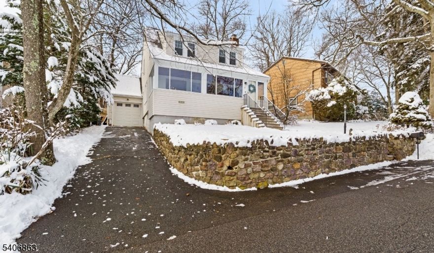 Experience the perfect blend of classic charm and modern comfort in this stunning Rental home located at 11 Longview Trail East in the highly desirable Indian Lake community. Completely renovated within the last four years, this sun-filled residence features gorgeous, newly refinished hardwood floors throughout and a magnificent fireplace that anchors the home with character. The spacious floor plan includes a formal living room, a formal dining room, a bonus family room off the back, and a large, bright sunroom perfect for relaxation. With three generous bedrooms and two full bathrooms, there is plenty of space for everyone. The backyard is a private oasis, boasting a patio and a brand-new wood privacy fence and yes, pets are welcome! Storage is never an issue thanks to the full, unfinished basement and additional garage storage space. Residents can enjoy the unique lifestyle of Indian Lake, with optional membership providing access to private beaches, motor boating, and vibrant clubhouse events. Perfectly situated in a quiet neighborhood, you are just minutes from the boutique shops and dining of downtown Denville, with easy access to major highways and the NYC direct train. Available for immediate move-in, this home is ready to welcome you. Utilities & lawn/snow maitenance responsibility of tenant.