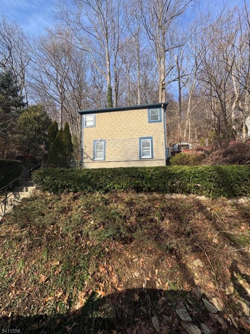 Welcome to 233 Franklin Road, enjoy cozy, lake-style living in this inviting home featuring an updated open-concept living room and kitchen combination. The main level also offers a full bathroom and convenient laundry room for added functionality. Upstairs, you'll find two versatile rooms that can serve as bedrooms, a home office, den, or additional living space.Come experience all this property has to offer and embrace the relaxed lifestyle of Indian Lake community.