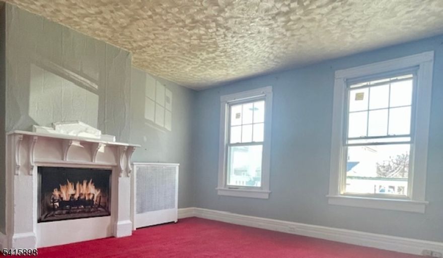 Located near the East Orange shopping district and convenience stores. Short distance to multiple bus lines and commuter train routes.