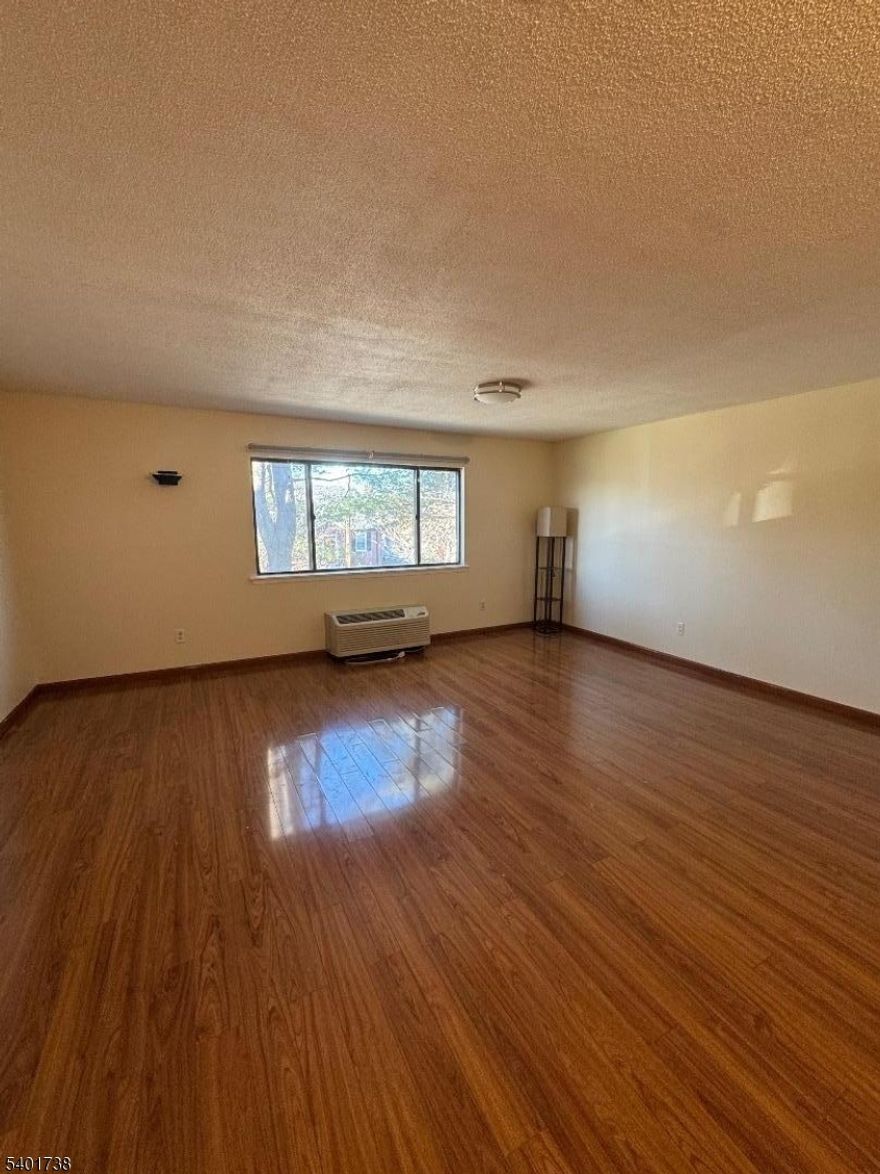 Moving to this newly painted, spacious two bedroom apartment featuring an open layout with a large living room and dining area. Spacious primary bedroom with a walk in closet. In unit washer and dryer included. Two parking spaces included. Electric utilities, No pets allowed. Required employment and income verification.