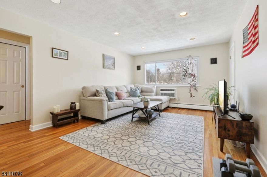 Meticulously maintained 2nd-floor condo offers a perfect blend of comfort and convenience. With a spacious layout, this 1-bedroom, 1-bath unit boasts beautiful hardwood floors and an abundance of natural light pouring in through large windows. Enjoy ample storage options, including generous closets and pull-down attic access. Located near shops, restaurants, and parks. HOA fees covers heat, sewer, water, and maintenance of common areas, along with snow removal and trash collection allowing you to focus on enjoying your fantastic new home!