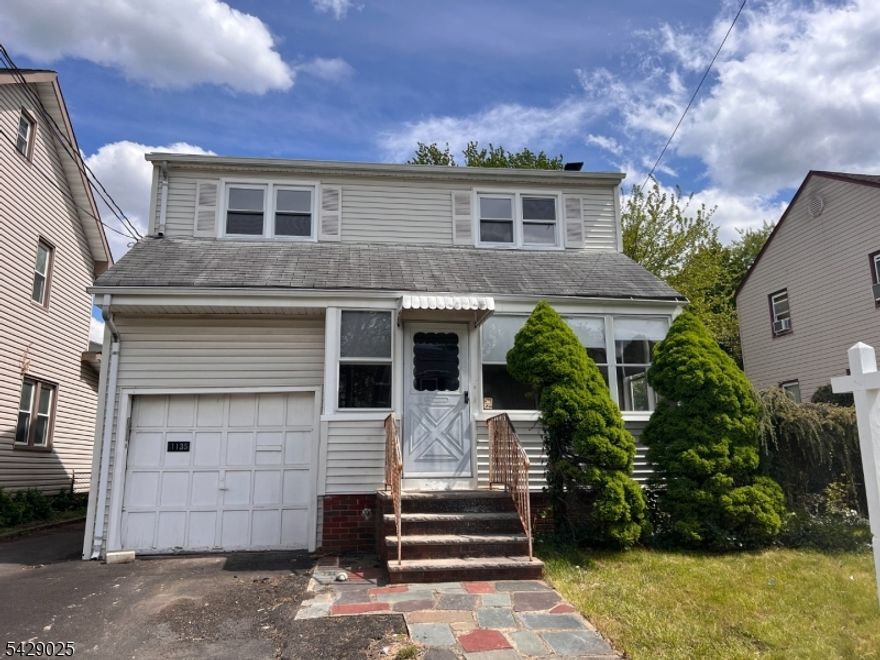 Great location meets incredible potential in this 3 bedroom, 1.5 bath colonial. Featuring an in-ground pool and a classic layout, this home is ready for a complete renovation. Perfect for investors or buyers eager to create a customized living space in sought-after area. Home is sold in AS-IS condition.