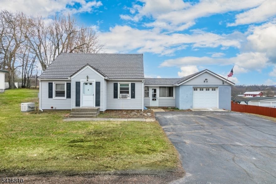 Don't miss this cute as a button Cape Cod home adorned with a Metal roof and thermal windows with an attached garage. Hardwood Flooring throughout main floor. Includes a Whole house generator that runs on Natural gas, a newer boiler and a French drain! Lovely views of nature. Just a few minutes from the highway, yet far enough away to feel the tranquility of the changing seasons. The backyard is spacious and ready for your green thumb and entertaining. Additional bath is plumbed and ready for your finishing touches in the 2nd story bedroom. LOW TAXES!!