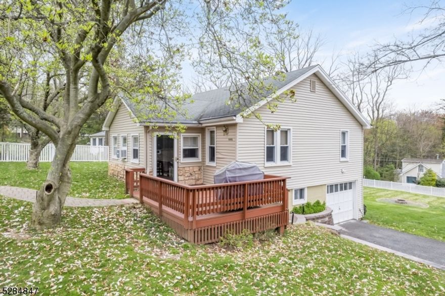 RANCH LIVING IS THE REAL DEAL at 840A Park Road, where you can settle right in to this immaculate, updated 2 Bedroom, 1 Bath charmer! Boasting more natural sunlight than imaginable, take pleasure upon entering the bright Foyer/Bonus Room via an inviting wood Porch/Deck, ideal for Front Yard fun or just relaxing with a morning cup of coffee. Immediately be drawn to the dazzling hardwood floors that sweep their way throughout the entire home. Gorgeous updated Eat-In Kitchen impresses with crisp white cabinetry, granite countertop, subway tile backsplash, farmhouse sink, stainless steel appliances, wood-counter breakfast bar, and stunning stone detail that carries through to the open concept Living/Dining Room. Both Bedrooms are generously-sized with spacious closets and ample light. Newly renovated Full Bathroom is sleek with modern white finishes and bathtub/shower with subway tile surround. Unfinished Lower Level promises great potential for Home Office and/or Exercise Room. Backyard is sheer perfection on an expansive level 1/3 acre, and features a magnificent covered pergola with electricity, the absolute best for outdoor entertaining! Walk across the street to Mt. Tabor school, minutes to NJ Transit train, and easy access to major highways, look no further than this ravishing Ranch residence. 840A Park Road is a MUST SEE!