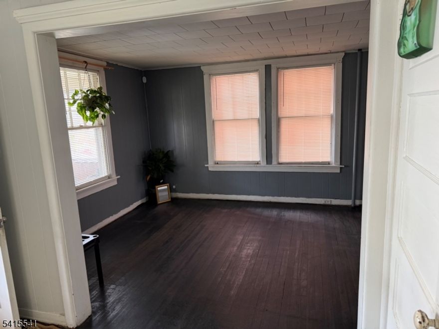 Welcome home to 13 Emerson Pl. This 3 bedroom 2 bath boast larger rooms with ample light. The 1st floor has an office area and full bath. Both the electric panel  and hot water heater are new. The furnace was recently serviced and work as designed. Make this home yours!