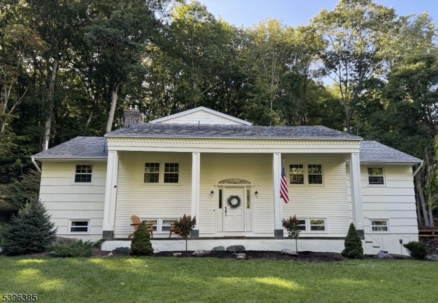 This wonderful home is situated on 1.3 acres of private grounds in the private community of Smoke Rise. Enter into this freshly painted, custom oversized bi-level home with a formal dining room for special occasions. Large living room with wood-burning stove for those cold, cozy winter days. The living room also has oversized sliders to the custom deck & paver patio. Updated large front-to-back country kitchen with a separate dining area. Gleaming hardwood floors. 3 bedrooms, master bedroom has a coffered ceiling and an updated bath, and a walk-in closet. The lower level has a great room with a beamed ceiling, floor-to-ceiling brick fireplace, wood-burning insert, custom built-in bookcases, and oversized sliders to access the rear yard. There is 3rd full bath with a whirlpool tub. There is an additional room ideal for a playroom or home office. Laundry room. The garage is heated. Generator hook up. This is not your standard custom oversized bi-level. It is a must-see! Year-round lake and community activities include fishing, swimming, boating, tennis, and a clubhouse. Top Schools, Near County Park.