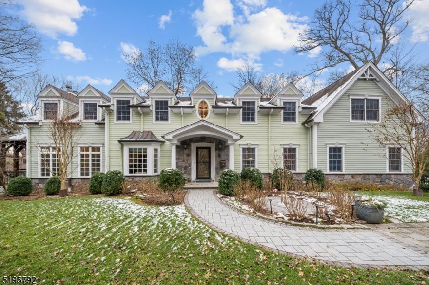 Built new construction 2004. Sophistication meets style and utmost privacy in the sought-after Old Country Club section of Ridgewood. Immaculately designed with every modern amenity and 9-foot ceilings throughout, and a secluded backyard oasis featuring a trendy porch and heated gunite pool & spa. Extensive main level with an open concept at the heart of the home featuring a (2019) Peter Salerno eat-in kitchen with a marble center island and Wolf and Subzero appliances, a casual dining area, and an 11-ft ceiling great room with fireplace. Convenient 1st-floor bedroom, full bath, formal living room with coffered ceiling, and dining room wraps up the 1st level. Upstairs, find an impressive primary suite with a walk-in closet, and stunningly upgraded spa-like bath, 2 bedrooms with jack & jill bath, another bedroom, and full bath. Large finished basement offers a full bath, game room, bar, and attached 3-car garage. Prime Highland Ave location near schools, train & bus to NYC & more!