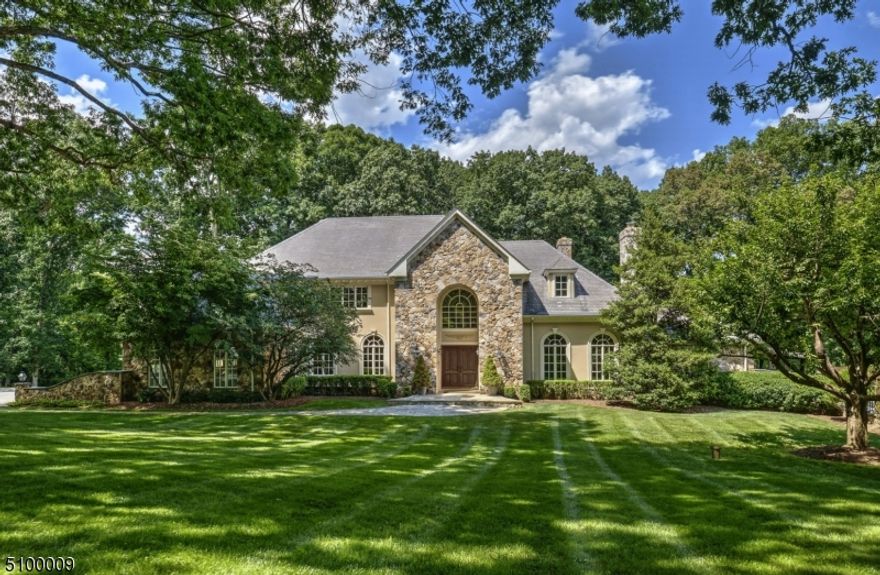 Traditional custom home situated on 3.99 private and manicured acres at the end of a cul-de-sac. 6 Bedrooms, 5.1 baths, wonderful open floor plan that includes a massive Kitchen with hardwood floors, stainless appliances, wet bar and custom crisp white cabinetry. A mahogany paneled library with fireplace, sunroom with french doors to pool area. Family room with a stone fireplace  and french doors to an expansive deck.  First floor bedroom with full bath. Primary bedroom on second floor with 2 walk in closets, large bath with steam shower and a jetted tub. Second floor laundry, upstairs office and 4 bedrooms complete this second level. Finished lower level with rec room, gym, playroom and full bath. 4 car garage, in ground pool, Recently upgraded 4 zone HVAC units and 2 hotwater heaters,  full house generator,  close to schools, transportation and shopping. Low Taxes- meticulously maintained