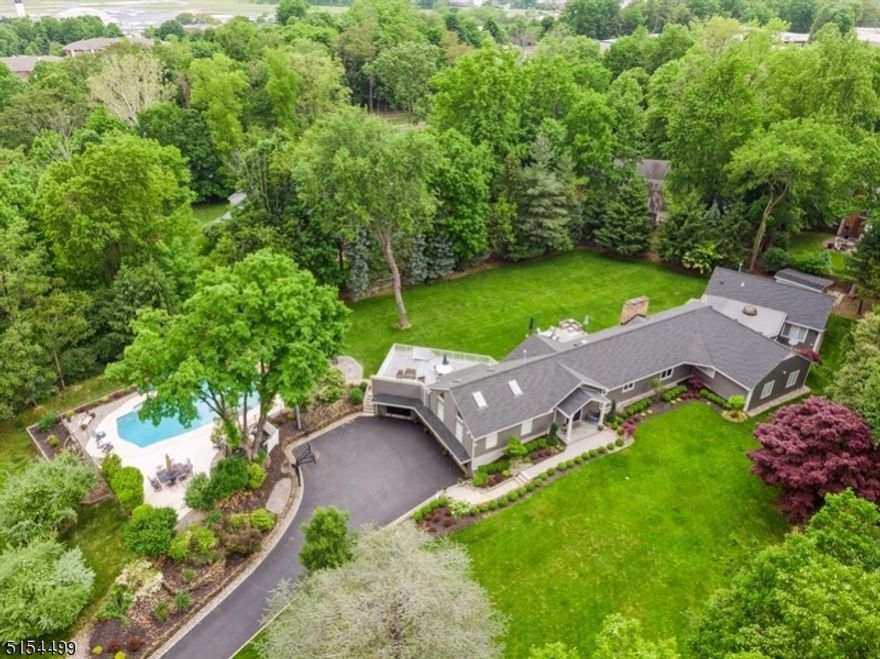 MUST SEE! 2 Acre Private Retreat, Completely Renovated, Turnkey/Entertainers Dream House, 4900+ Square feet, Secluded Fenced in Private Property, 3 Car Garage, Fully Renovated Kitchen and Bathroom, Massive 10x8 Marble Island, Open Concept Kitchen/Family Room/Wet Bar, Plank Wood Floors, 5 Bathrooms/ 5 Bedrooms/ Plus Office, Formal Dining Room, GYM, Game Room, Finished Basement/ High Ceilings with walkout door, Renovated Oversized Gunite Pool approx 20' x 40' with built in Hot Tub, Professionally Landscaped/Lawn Sprinklers, Security System, Large Patio and Deck Areas, Large Storage Shed