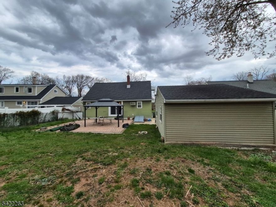 Charming and well-maintained 3-bedroom, 2 full bath home with finished basement. First floor features a recently renovated kitchen ,formal living room, formal dining room with access to backyard, and two spacious bedrooms. Second floor offers a large primary bedroom with full bath. Finished basement includes two additional rooms suitable for office, guest, or flex use. The huge backyard offers you many outdoor options as well. Conveniently located near major highways and NYC transportation.