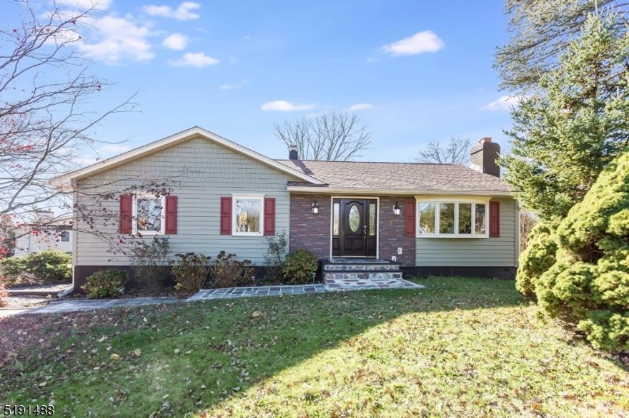 Elegant ranch home with 3 bedrooms, 2 Bathrooms, wonderful main floor living with easy flow from living room to dining room, to kitchen.  Enjoy the wood burning fireplace in the living room and tons of natural light from the big bay window.  Two sets of doors open to the expansive deck one from the kitchen the other from the dining room.  Great layout to entertain and for big gatherings.  The main hall on 1st level has 3 bedrooms and 1 full bath.  Living Room, Dining Room Main Hall and all 3 bedrooms have hardwood floors.  The eat in Kitchen has easy to clean laminate flooring.  The roof was replaced in 2019 and the siding in 2018.  Downstairs the ground level is finished and has access to the oversized 2 car garage.  The recreation room was completely re carpeted and painted in October 2022. Enjoy a 2nd wood burning fireplace and a full bath on the lower level!   Walk out the sliders to a blue stone patio and great back yard.  So close to all major highways rts 80, 46, 10 and 287.  Also enjoy all the dining shopping and movie theaters very close by.  The schools are close by and part of the Parsippany School System.  Central air not working and sold as is. This home Priced to sell! Don't wait.