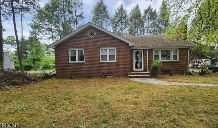 MAKE THIS HOUSE YOUR OWN DESIGNED HOME! This is an all brick ranch style home on a nice level lot. The property needs TLC and is being SOLD AS IS. It has a spacious eat in kitchen, living room, 3 bedrooms and a full bath on the main level. The basement could be a nice recreational flex space, it's partially finished with a laundry room and 3/4 bathroom. The boiler and hot water tank have been recently installed. There is a decomissioned oil tank underground. There is a 2 car garage along with a long driveway that can allow for several more vehicles. FHA 203k/renovation loans, cash loans preferred, due to condition of the property. Seller will not make any repairs. Buyers are responsible for township inspection certificates.