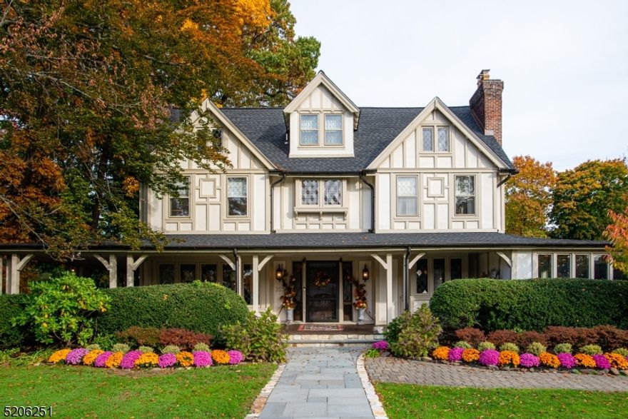 Your new home awaits on one of Glen Ridge's best blocks in town! Enter this lovely, historic Tudor-style home built after 1900 that exudes warmth and style. A fabulous house for entertaining with an open floor plan and high ceilings creates a harmonious flow throughout this beautifully-designed house. A new custom kitchen installed with high-end appliances, a 10' x 6' marble eat-in kitchen island, and Pella floor-to-ceiling bi-fold doors opens to a stunning custom stone patio. Boasting endless upgrades and original details, this stately home has 7 impressively large bedrooms, 4 full baths, 2 half baths, and a partially finished basement set upon a beautifully landscaped half acre of land. NYC trains, top rated schools, nearby award-winning restaurants all await and welcome you to the charming town of Glen Ridge.