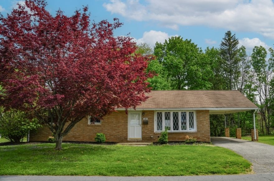 Beautifully maintained, move-in ready 3-bedroom, 1.5-bath ranch offering comfort, style, and thoughtful updates throughout. Enjoy a spacious layout, abundant natural light, and original hardwood floors (refinished in 2023) that extend throughout much of the home including beneath the carpet in the living room and primary bedroom. The kitchen and bathrooms were tastefully renovated just 2 years ago, featuring granite countertops and stainless steel appliances. Additional improvements include new interior doors and trim, updated electrical receptacles and switches, and new ceiling fans in the bedrooms, creating a fresh, modern feel. In 2023, a new indirect hot water heater was installed, along with an epoxy-coated floor in the finished portion of the basement ideal for a rec room, home office, or additional living space. Step outside to a generously sized backyard, perfect for outdoor entertaining and summer barbecues. A true turnkey opportunity just unpack and enjoy!