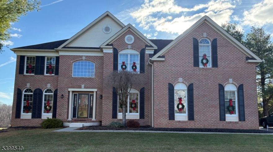 Beautiful Modern Georgian Colonial with an Exceptional Floor PlanThe first floor features an open layout that includes a Living Room, Dining Room, private Office, and a spacious Eat-In Kitchen with 42" cabinets, granite countertops, a center island, and stainless-steel appliances. Off the kitchen is an impressive Morning Room (10 10 bonus room) with skylights and stunning open mountain views. The Expanded Family Room offers double-height ceilings, oversized windows, and a wood-burning fireplace. A separate Laundry Room and a Half Bath complete the first level. A rear door leads to a 1,000 sq. ft. paver patio overlooking the garden and mountain scenery.The second floor offers a thoughtfully designed bedroom layout. The spacious Primary Suite features a separate sitting room (includes an attached 11 11 bonus room), a large bathroom with a Jacuzzi tub and a beautifully tiled separate shower, plus two walk-in closets. On the opposite end are three additional bedrooms: a guest bedroom with its own private full bath, and two bedrooms connected by a Jack-and-Jill bathroom.Additional highlights include a three-car garage, a full lower level with 9-foot ceilings, natural gas heating, Trane two-zone central air, an open lot with long-range mountain views, and two bonus living spaces for added flexibility.