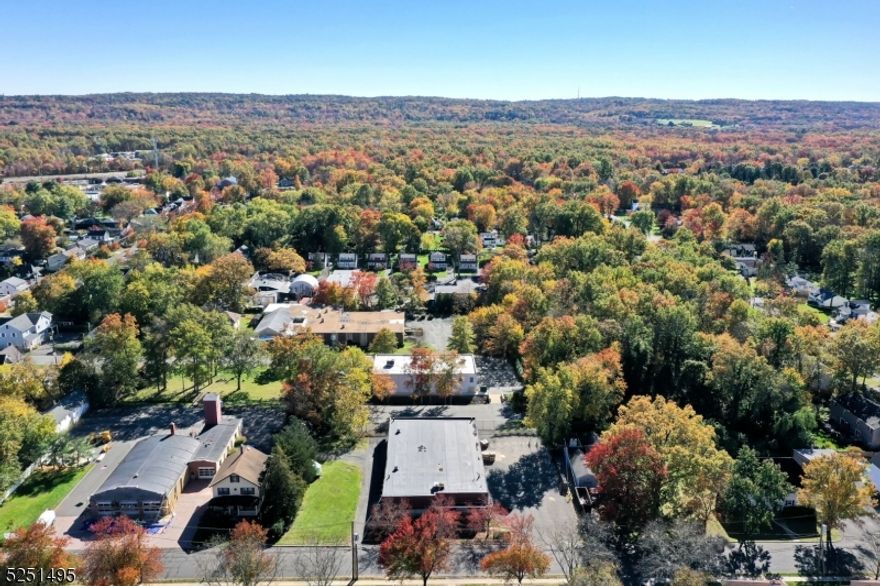 This property features a Warehouse and Light Manufacturing Building situated on over half an acre within an L-2 Light Industrial Zone. The structure comprises 8340 square feet of Warehouse space and approximately 1000 additional square feet designated for Office use. The Warehouse boasts an impressi 14 feet 6 inch ceiling height, with a convenient 12 feet by 12 feet drive-in door. The electrical infrastructure is robust, offering 600 amps, 3-phase power, at 230 volts. The property is equipped with a comprehensive Fire and Security System throughout. In 2019, we implemented a comprehensive warehouse camera system to enhance security measures. The following year, a new HVAC motor was installed, ensuring efficient climate control. In 2020, a new roof was added, backed by a 10-year warranty for peace of mind. Subsequently, in 2021, the building received an upgrade with the installation of modern LED lighting, significantly improving illumination. The kitchen was updated in 2023 along with upgraded office flooring, providing a fresh and inviting workspace. Lastly, on October 1st, 2023, new loading door springs were installed, further optimizing functionality. There's ample parking available, and an adjoining lot presents opportunities for expansion or additional parking needs.