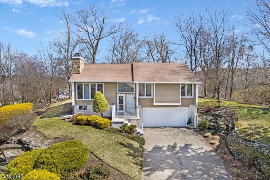 This stunning 3-bedroom, 2.5-bath Bi-level/Contemporary Panther Valley residence has breathtaking views and a prime cul-de-sac location, making it the ultimate choice for your next home. As you step inside, you'll be greeted by cathedral ceilings in the living room, complemented by a cozy fireplace, creating an inviting ambiance ideal for both unwinding and entertaining. Natural light floods the space, enhancing a neutral decor allowing the surrounding natural beauty to shine. 2 slider doors connect the indoor living space to a private rear yard, providing effortless indoor-outdoor living. The vaulted master bedroom and skylit baths add an extra touch of sophistication, offering a sanctuary to retreat to at the end of each day.The spacious family room is a perfect spot for gathering and relaxation, while the oversized 2 car garage offers storage and room for a workshop. Immerse yourself in the welcoming Panther Valley community and enjoy many amenities, including 3 pools, basketball, pickleball, and tennis courts, as well as playgrounds, ensuring there's something for everyone to enjoy right in your neighborhood.The community's proximity to Route 80 ensures effortless commuting and quick access to shopping and restaurants, allowing you more time to enjoy the comforts of your beautiful new home.Whether you're craving relaxation or seeking adventure, Panther Valley provides the perfect backdrop for any lifestyle.Don't let this opportunity slip away make this your forever home!