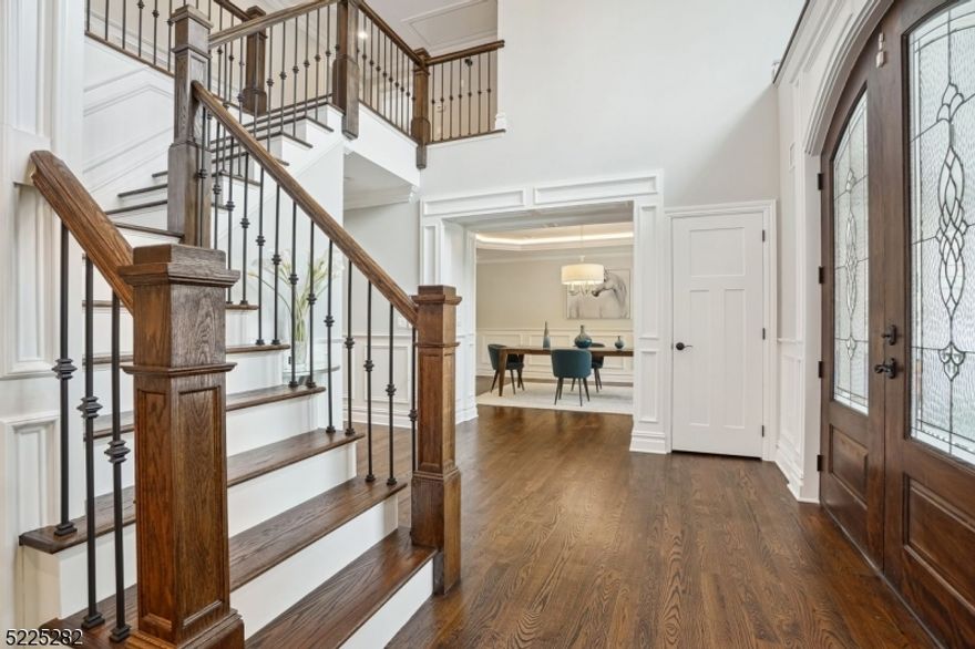 This 6 Bedroom, 6 Bathroom home offers every amenity to enjoy luxury and convenience.  The inviting grand foyer beautifully displays the impeccable details and expansive layout of this home offering soaring ceilings and elegant millwork throughout. The formal living and dining rooms exude elegance. The chef's kitchen is perfect for cooking and entertaining as it opens to a large living room that leads to the spacious backyard and is equipped with a Thermador double oven, refrigerator and dishwasher, all stainless steel appliances, and an oversized granite island. All bedrooms offer connecting bathrooms and the sprawling primary suite offers a luxurious en-suite bathroom. The bonus room above the garage can be used as a private office with separate entrance or guest suite. The finished basement with soaring ceilings offers endless possibilities for fun, entertainment and exercise with a pilates/yoga studio, gym and generously sized recreation room. And to ensure maximum comfort without interruption, the home is equipped with a whole house Generac generator. Enjoy comfort and style in over 6800 sq ft on .76 acres of private, level grounds, which offer plenty of space for a pool, tennis/pickleball courts, outdoor kitchen...the possibilities are endless.