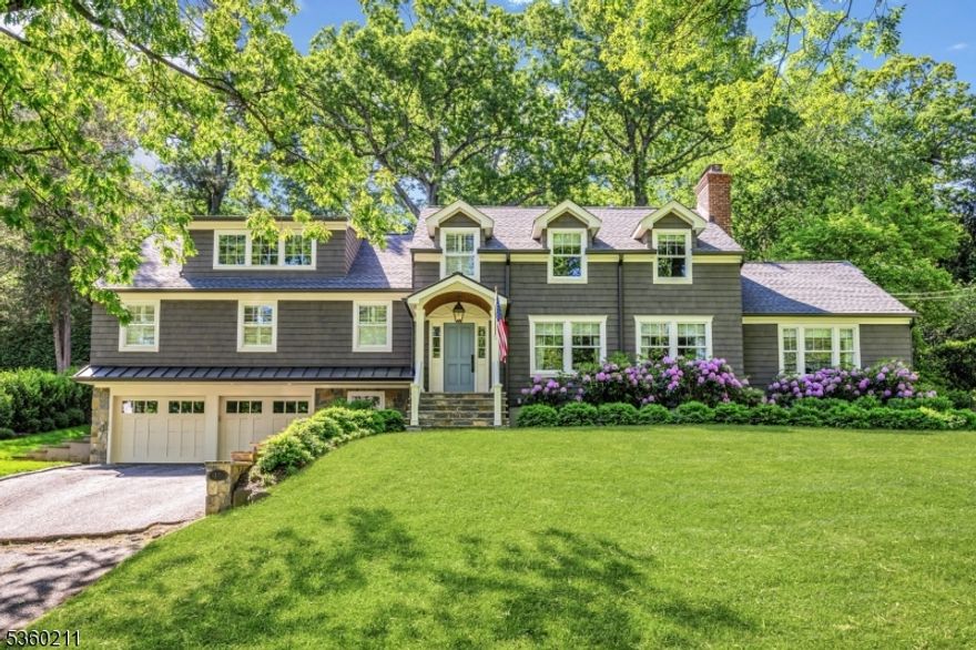 This stunning 5-bedroom, 3.5-bath shingle-style home, designed by Rosen, Kelly, Conway was custom-built from the foundation up in 2022 with every modern luxury. The chef's kitchen features custom white maple cabinetry, a center island, Viking 8-burner cooktop, double ovens, side-by-side fridge/freezer, Sub-Zero refrigerator drawers, Bosch dishwasher, and butler's pantry with sink, Sub-Zero wine & beverage fridges. The open-concept vaulted family room adjacent to the kitchen showcases a cedar tongue & groove ceiling, fireplace, & French doors to a bluestone patio. Entertaining is a pleasure with the banquet-sized dining room with fireplace. A luxurious primary suite with private garden access offers a marble spa bath with dual vanities & soaking tub. A water closet with a door and a generous walk-in closet complete the suite. Four additional spacious bedrooms with custom closets, a sizable bonus/media room, & marble bathrooms with Kohler fixtures complete the upper floors. The finished basement adds custom storage and an additional recreation area. Professionally designed by Cording Landscape, the park-like grounds, featuring 10-zone irrigation, include privacy fencing, mature oaks, sugar maples, lush gardens with hydrangeas, rhododendrons, and more. Additional highlights: oversized windows, solid-core paneled doors, designer lighting, plantation shutters, extensive millwork, 4-zone HVAC, 5-router WiFi network, & Bose ceiling speakers. Luxury living rebuilt to perfection!