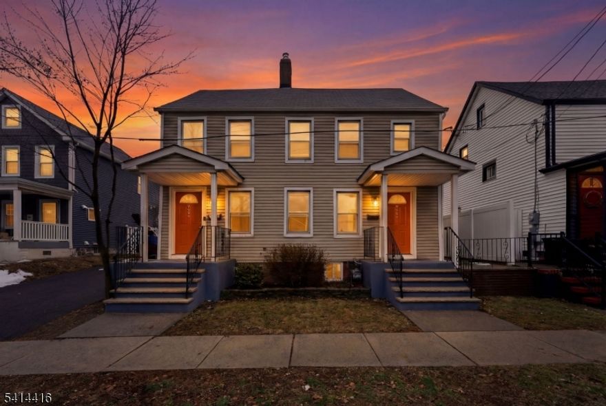 Three-level townhouse-style duplex featuring a modern, functional layout with thoughtfully selected finishes. Main level offers an updated kitchen that flows into a spacious dining area, creating an open and practical living space. Sliding doors provide access to a concrete patio that extends to a large private backyard, offering additional outdoor space for everyday use. One dedicated parking space included with no alternate side parking restrictions. Conveniently located near shopping, dining, and local amenities, providing easy access to daily necessities. Ample space across all three levels designed for comfortable living.