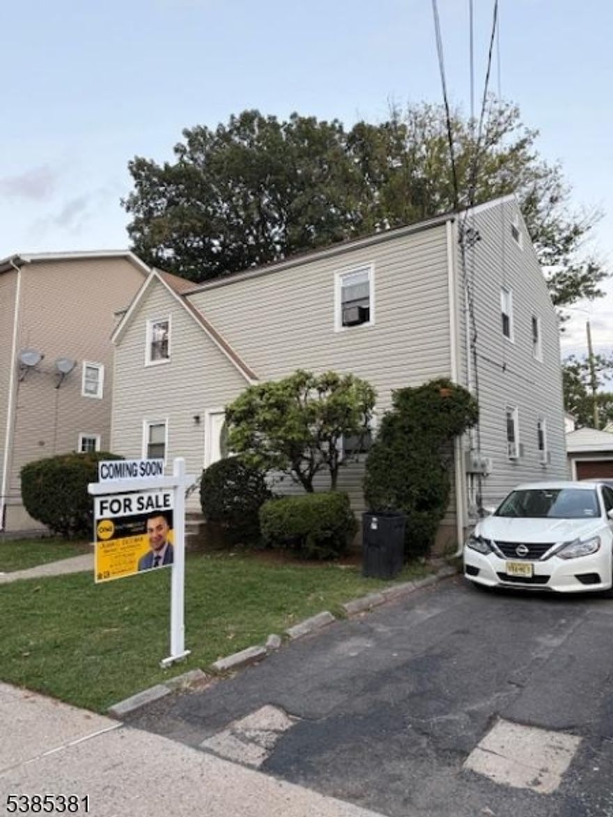 Welcome to the multi-family you have been waiting for!!! The first floor has two bedrooms plus access to the basement with a finished room and bathroom, perfect for extra living space.  Upstairs you will find 2 more bedrooms, giving you plenty of room for everyone.  Enjoy the convenience of a 2-car garage, a driveway that fits up to 4 cars and a great back yard to relax or entertain.  Tucked away from the main road yet just a short walk to ShopRite and mass transportation.  Don't let this gem pass you by!!!!