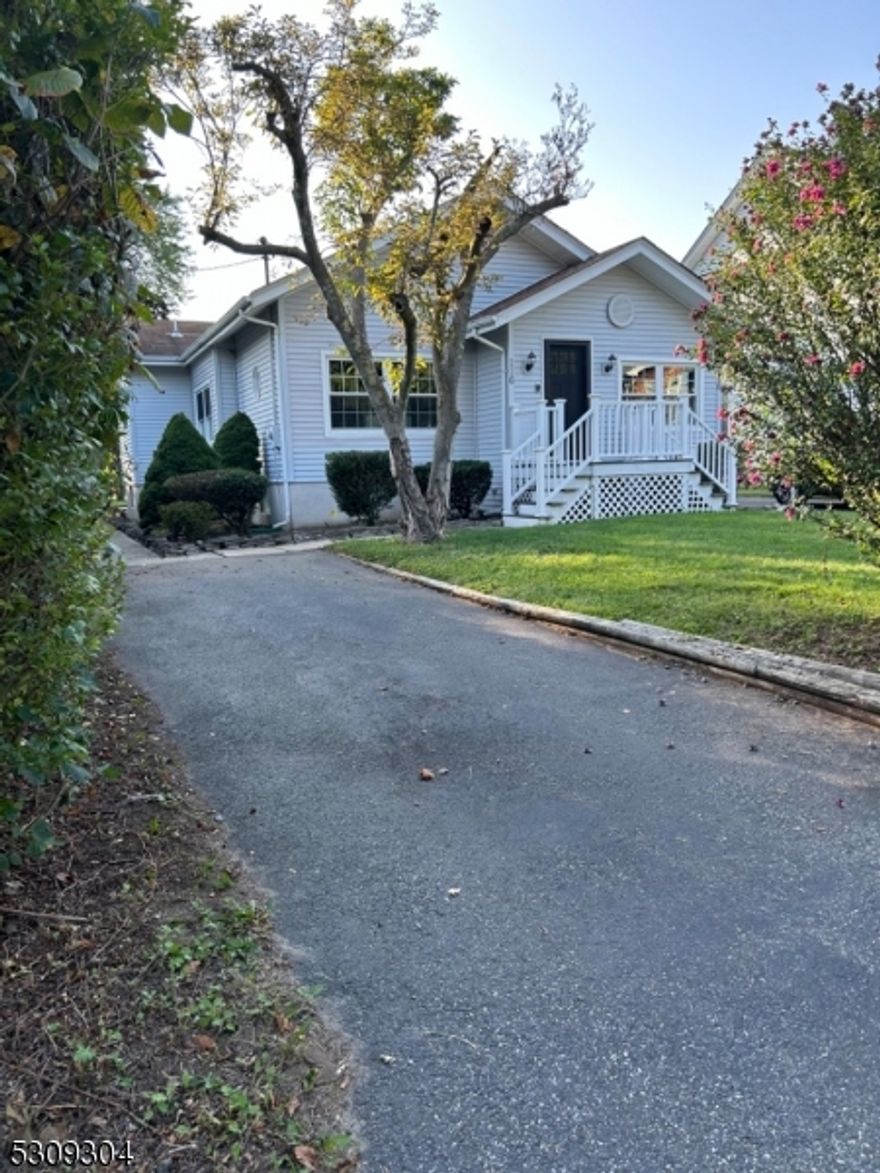Wow, this house belongs on the cover of a magazine!  Beautifully renovated throughout, gorgeous kitchen, modern bathrooms, and nicely appointed bedrooms.  There is plenty of storage room in the basement, ample parking space, and a very nice backyard.
