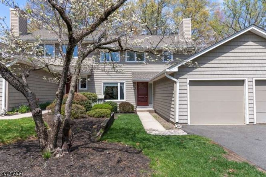 Welcome to this well-maintained townhouse located in Phase One of desirable Ramapo Ridge, just minutes from Route 17. This spacious two-story, colonial-style home offers generously sized rooms and a functional layout.The main level features a bright living room with a cozy fireplace and custom built-in bookcases, a separate dining room with sliding glass doors leading to a private deck, and a large eat-in kitchen with an additional dining area ideal for everyday living and entertaining.Upstairs, you'll find three spacious bedrooms, including a primary suite with a full private bath. Additional features include wood and tile flooring, central air conditioning, and natural gas heating.Enjoy the convenience of a one-car garage with interior access, a private deck, and ample parking. Ramapo Ridge offers resort-style amenities including a clubhouse, in-ground pool, tennis courts, pickleball, exercise room, playground, and more.
