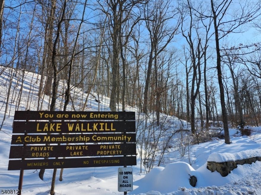 Welcome to Lake Wallkill community. This home features are: Cathedral ceiling Living Room, Kitchen, 2-Bedrooms and a full bath on the first floor, second floor feature a finished room can be used as an office, den, or guest room. The basement has an exterior entrance with utilities room and laundry area. Partial lake views; enjoy this wonderful lake and all the community has to offer. Close to hiking, snow activities, swimming, fishing, biking, golf, boating and so much more!