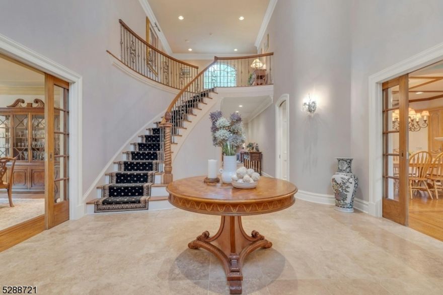 Stunning 5900 sq ft Custom built French Country Colonial Manor on almost an acre of property in Sought after Hartung Location. Enjoy your summers in an outdoor pool with full cabana that includes kitchen, FB and changing room. Play Basketball on the court in the backyard and enjoy complete privacy and the never ending blooming tons of perennials. So many items of high quality consideration in this house including the full paver courtyard patio/drive full house generator, travertine, marble, pecky cypress, Neimann Weeks chandeleir, 5 fire places all converted to gas for ease of enjoyment. 1st floor Primary BR and upstairs is a 2nd Primary (w FP) Suite of rooms with laundry on both floors. Additional ensuite BR and 2 more all with vaulted ceilings and private baths. Great room with Bar area includes it 's own dishwaher and game table area. Sonos surround sound throughout 1 st floor and basement The space is incredible. The architecture is incredible AND The location is incredible