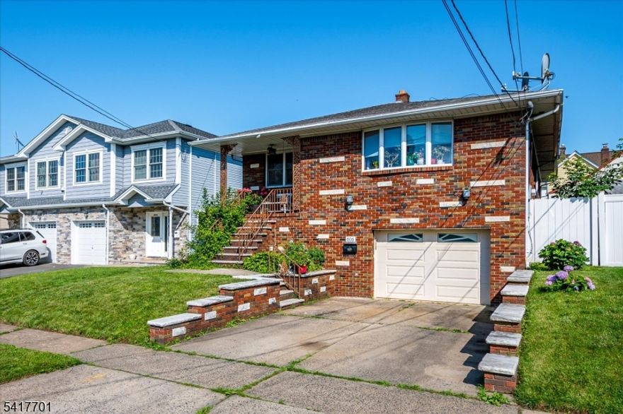 This 4 Bedroom , 3 Bath Meticulously Well Maintained Home Features a Fenced In Back Yard, Hardwood Flooring, Custom Wood Kitchen Cabinetry And More. Lush Backyard Provides Privacy And Space For Gathering And Entertaining. Conveniently Located Near Shopping, Schools And Transportation. Complete Home Warranty Provided At Closing.