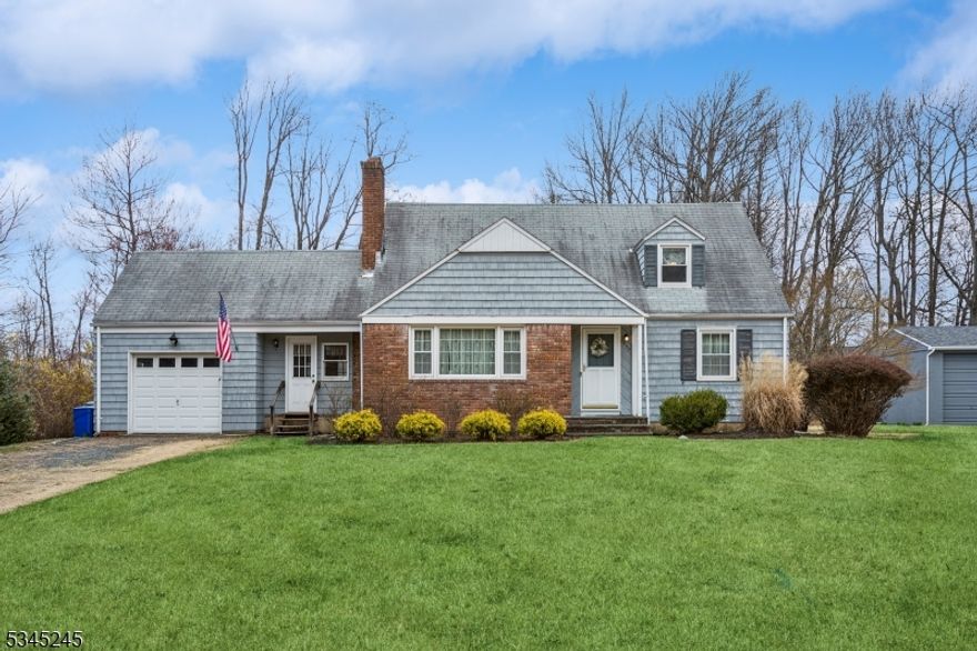 Bring your contractor and your dreams to this lovely home, tucked away on a quiet street on the south side of Scotch Plains. Incredible opportunity to renovate or build your dream house on over an acre of land! Well loved by the people who built it, this home is full of potential and ready for its next adventure. The entrance foyer leads to the sun-drenched living room with fireplace. The enormous eat-in kitchen, with sliders to the deck, can be reconfigured in so many ways. Two bedrooms and a full bath complete the first floor. The second floor features two additional bedrooms and a full bathroom. Beautiful hardwood floors can be found throughout. The large full basement has abundant storage and offers so much flexibility to be finished as a playroom, media/game room, den, or whatever you imagine it to be. Conveniently located close to schools, community centers, highways and transportation. Busses to Coles Elementary, Terrill Middle and SPF High School stop right at the corner of Frank Street and Raritan Road. The highly rated Scotch Plains school system has full day Kindergarten.