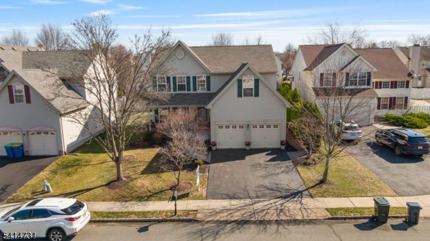 Perfectly positioned on a premium cul-de-sac lot in one of Bridgewater's most desirable neighborhoods, this impeccably maintained 4-bedroom, 2.5-bath offers the ideal blend of elegance, comfort, and location. This home is drenched in warm natural light. The beautifully landscaped backyard stays comfortably shaded during summer months for morning coffee, and weekend barbecues on the pristine brick patio. Step inside to a dramatic two-story foyer with open floor plan designed for both entertaining and everyday living. The upgraded kitchen features stunning Carrara white quartz countertops, SS appliances, 42-inch cabinetry, and a dining area with a bay window overlooking the backyard. The kitchen flows into the family room with a cozy fireplace. An extended formal dining room with an elegant bay window and a separate living room. A first-floor laundry/mud room with cabinetry and a powder room add everyday practicality. Upstairs, four spacious bedrooms with wood flooring. The primary suite is your private sanctuary, complete with a walk-in closet, additional "his and hers  closets, a dedicated office/sitting area, and a renovated spa-like bath featuring a double vanity, soaking tub, and glass-enclosed shower. The full basement expands your living space with a large recreation area, gym space, generous storage, and a partially finished room perfect for guests, or a home office. Located just minutes from top-rated Blue Ribbon schools, major highways, and NJ Transit.