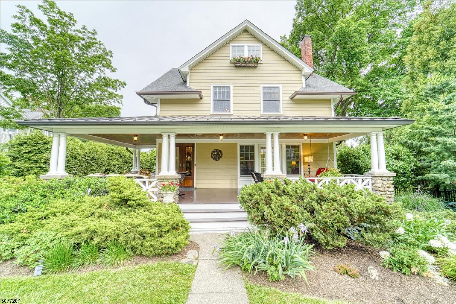 The beautiful lemonade front porch sets the stage as you enter this lovely home which has been fully renovated from top to bottom. The living room's focal point is the beautiful fireplace surrounded by built-ins & the french doors that open to the porch. The formal dining room has beautiful beams & a large window seat overlooking the yard. Brand new white kitchen features Jenn Air professional dual fuel range, Stainless appliances, quartz counters, breakfast island-opens to the family room w/ french doors to large deck. 1st flr bedroom &full bath complete floor. Upstairs you will find Large Primary suite w/ fplc, Cathedral ceilings, &lux master bath. 3 Additional bedrooms, Main Bath& laundry. 3rd floor is fully finished. Lower Level has tons of space. Professionally landscaped property w/ deep private yard!